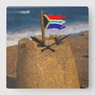 Reloj Cuadrado Castillo de arena con bandera sudafricana, Umhlang