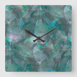 Reloj Cuadrado Cian verdoso avispado sobre un yeso de pared inaca