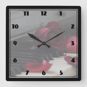 Reloj Cuadrado Claves de piano con una rosa roja