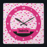 Reloj Cuadrado Corazones en colores pastel en el rosa<br><div class="desc">Este reloj femenino lindo ofrece un fondo rosa claro,  púrpura,  anaranjado y verde del modelo del corazón acentuado con una raya rosada y una caja rosada con el texto adaptable para la personalización.  Este reloj rosado del corazón hace un acento perfecto para un dormitorio de los chicas.</div>
