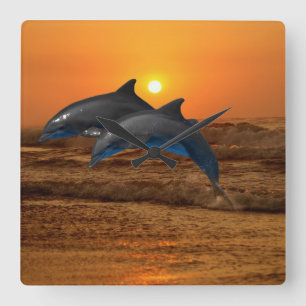 Reloj Cuadrado Delfín de Bottlenose en la puesta del sol