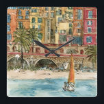 Reloj Cuadrado Destinos | Playa y edificios acuáticos<br><div class="desc">Una hermosa acuarela y diseño de tinta creados por la brillante Melissa Wang, traídos a ustedes por el World Art Group. En el primer plano de esta pieza se puede ver un pequeño velero a la orilla de una pequeña playa poblada de varios objetos, personas y palmeras. Esta escena podría...</div>