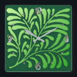 Reloj Cuadrado Fern estilizado de estilo Art Deco, tonos verdes<br><div class="desc">Un estilizado patrón de papel pintado de helecho Art Déco en un gradiente suave,  sombreado y verde sobre un fondo verde esmeralda profundo con números de plata</div>