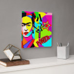 Reloj Cuadrado Frida POP ART<br><div class="desc">"Frida Lives" con un retrato de arte pop de colores de Frida Kahlo - Reloj de pared cuadrado,  estilo de ART POP por diseño de O.M</div>