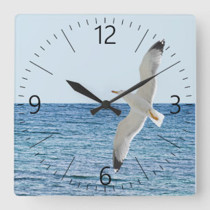 Reloj Cuadrado Gaviota volando sobre el mar