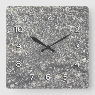 Reloj Cuadrado Gray granite interspersed with white elements.
