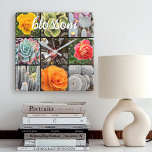 Reloj Cuadrado Guión de cita de citación de Collage de fotos de R<br><div class="desc">Rosas brillantemente rojos, amarillos y de matiz naranja y exuberantes cactus verdes, acuáticos y negros gritan cálidos días de verano. Disfrute de las flores y del ambiente tranquilo de un vibrante jardín cada vez que mire la hora en este impresionante reloj de pared fotográfico. ¡Hace un gran regalo de bienvenida!...</div>