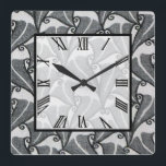 Reloj Cuadrado Hojas de Art Deco<br><div class="desc">Reloj acrílico de pared de 10.75" x 10.75" con una imagen de un magnífico diseño Art Deco de hoja en blanco y negro. El cuadrado blanco transparente tiene una cara de reloj numérico romano y un borde negro. Vea toda la colección de Reloj de los años 20 en DECOR |...</div>