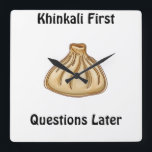 Reloj Cuadrado Khinkali<br><div class="desc">Khinkali is a traditional Georgian dish that has become a symbol of Georgian hospitality. These large, hand-crafted dumplings are filled with a savory mixture of minced meat (usually beef and pork), herbs, and spices. The dough is carefully wrapped around the filling, creating a beautiful knot at the top, which also...</div>