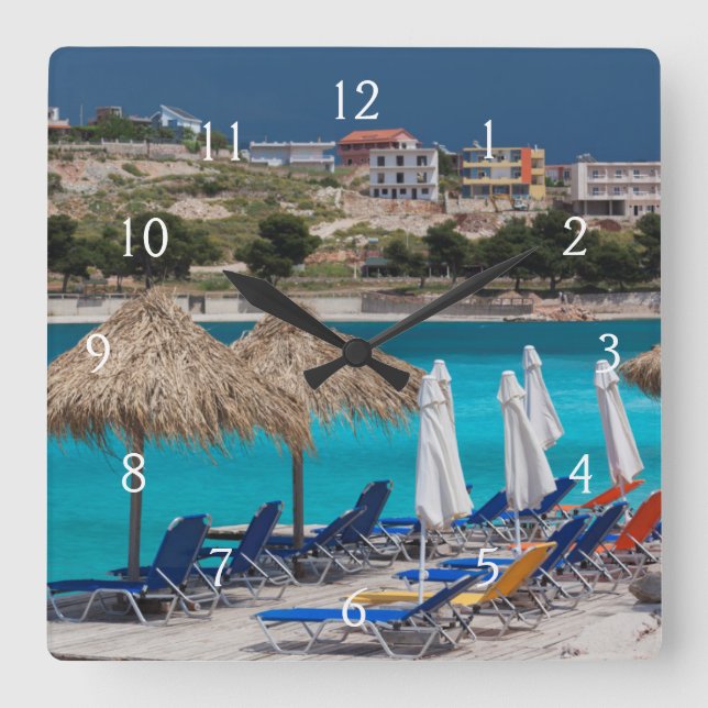 Reloj Cuadrado Ksamil, playa frente al mar (Anverso)