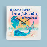 Reloj Cuadrado Mar de la sirena | Beber Como Una Playa Tropical D<br><div class="desc">Añade un poco de humor tropical a tu casa con esta divertida y caprichosa Mermaid Sea Drink Like a Fish wall clock. Este reloj le proporcionará un toque de diversión costera a su decoración. Con una sirena en la playa disfrutando de una puesta de sol en el océano y un...</div>