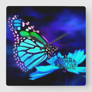 Reloj Cuadrado Mariposa en luz azul