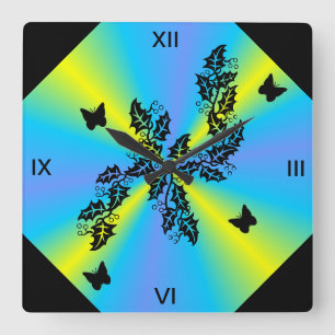 Reloj Cuadrado mariposa negra sobre arcoiris verde azul amarillo