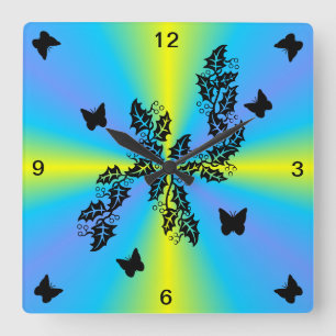 Reloj Cuadrado mariposa negra sobre arcoiris verde azul amarillo