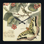 Reloj Cuadrado Mariposa y libélula con las flores rojas<br><div class="desc">El estudio de Vision creó esta escena de fascinación de una mariposa y de una libélula que agitaban cerca de un grupo de flores rojas. Si usted ama la naturaleza usted debe conseguir esta impresión para sí mismo. ¡También haría un regalo asombroso para alguien especial en su vida!</div>