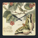 Reloj Cuadrado Mariposa y libélula con las flores rojas<br><div class="desc">El estudio de Vision creó esta escena de fascinación de una mariposa y de una libélula que agitaban cerca de un grupo de flores rojas. Si usted ama la naturaleza usted debe conseguir esta impresión para sí mismo. ¡También haría un regalo asombroso para alguien especial en su vida!</div>