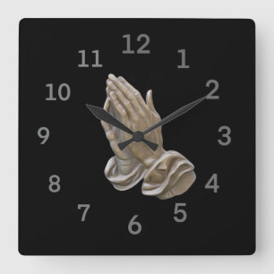Reloj Cuadrado Metalizado pintado con las manos rezando