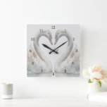 Reloj Cuadrado Monograma de cisnes románticos<br><div class="desc">Crea un recuerdo especial para tu hogar. Este reloj de pared cuadrado monograma presenta cisnes románticos. Colores neutrales. Personalizar los monogramas mostrados en el centro. Hace un gran regalo,  un regalo de boda,  un regalo de aniversario para bodas,  y más. Utilice la plantilla para personalizar.</div>