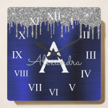 Reloj Cuadrado Monograma Metalizado cepillado con Purpurina azul<br><div class="desc">Purpurina de espuma metálica de Relieve metalizado Faux azul de plata y marina cepillado nombre de monograma Metalizado y reloj de pared de lujo inicial. Esto hace que el dulce perfecto cumpleaños 16, boda, ducha de novia, aniversario, ducha de bebé o fiesta de soltera sea regalo para alguien que ama...</div>