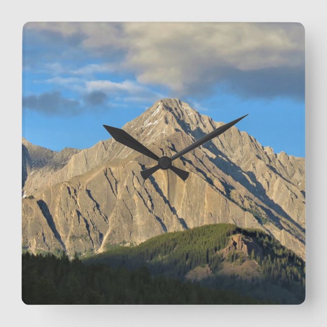 Reloj Cuadrado Montaña y bosque empantanados iluminados por el so (Anverso)