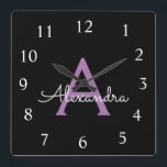 Reloj Cuadrado Morado Black Script Girly Monograma Nombre<br><div class="desc">Reloj de nombres de monograma con guión morado y negro. Esto hace que el dulce perfecto cumpleaños 16,  boda,  ducha de novia,  aniversario,  ducha de bebé o fiesta de soltera sea regalo para alguien que ama el lujo glam y los estilos de moda.</div>