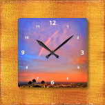 Reloj Cuadrado Naranja arcoiris cielo azul cielo paisaje foto<br><div class="desc">Aprecie la belleza de la naturaleza cada vez que mire la hora en este reloj de pared fotográfico de un arco iris enclavado en una puesta de sol azul, rosa y naranja iluminada con suavidad. Tu elección de una cara de reloj redonda o cuadrada. ¡Hace un gran regalo de bienvenida!...</div>