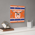 Reloj Cuadrado Naranja Blue Sports Jersey con nombre y número<br><div class="desc">Las franjas azules reales son perfectas para la cueva masculina. Si eres propietario de un equipo de Fantasy Football,  haz tus propios productos y alardes con tus amigos. O - ¿Juegas al fútbol de secundaria y quieres un recuerdo? Este diseño jersey es perfecto para cualquiera que juegue deportes.</div>
