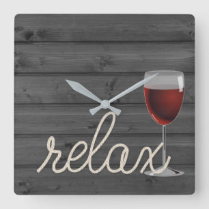 Reloj Cuadrado nautical rope on wood with red wine and relax text