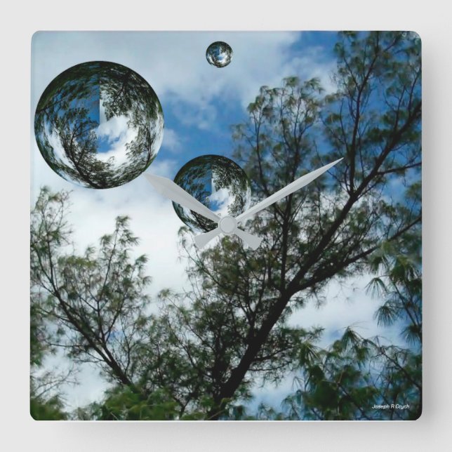 Reloj Cuadrado Orbs flotantes (Anverso)
