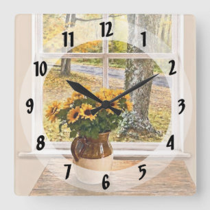 Reloj Cuadrado Otoño visto a través de una ventana