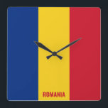 Reloj Cuadrado Patriótico de Bandera Nacional de Rumania<br><div class="desc">Bandera Nacional de Rumania Reloj de pared de la Plaza Patriótica con la bandera del país en los colores nacionales impresos a lo largo de las 24 horas. El nombre del país está sutilmente integrado en el diseño de la parte inferior. El texto es completamente personalizable usando "Personalizar". Característica. Este...</div>