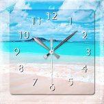 Reloj Cuadrado Playa de arena tropical hawaiana de color turquesa<br><div class="desc">Recuerde el fresco olor a sal del aire del océano cada vez que mire la hora en este impresionante reloj de pared de fotos de colores vivos. Explora y explora la soledad de una playa hawaiana vacía. Tu elección de una cara de reloj redonda o cuadrada. ¡Hace un gran regalo...</div>