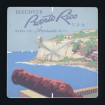 Reloj Cuadrado Poster de viajes de época promocionando Puerto Ric<br><div class="desc">Descubra Puerto Rico U.S.A. donde se encuentran las Américas. Poster de viajes de época que promueve el turismo en Puerto Rico,  mostrando las vistas al puerto desde el Castillo de Morro.</div>
