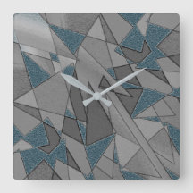 Recortes triangulares grises con trozos de azul os