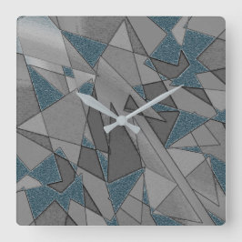 Reloj Cuadrado Recortes triangulares grises con trozos de azul os