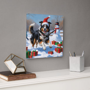 Reloj Cuadrado Rough Collie corriendo en la nieve con sombrero de