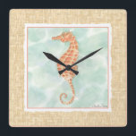 Reloj Cuadrado Seahorse del naranja del océano<br><div class="desc">¿Usted ha visto nunca un cierre del seahorse para arriba? Pozo ahora usted consigue esta gran obra de arte de Chariklia Zarris para añadir a su amor de la colección del caballo de mar. Zarris crea algunos de los mejores pedazos del arte de la vida marina que relajarán y calman...</div>
