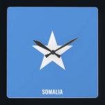 Reloj Cuadrado Somalia Flag Dazzling Patriotic<br><div class="desc">Somalia Flag Dazzling Patriotic Square Wall Clock in the colors and the elements of the Somalia national flag covering the front of the clock. National flag colors are complemented with the text "Somalia" on the bottom. Text is fully customizable using "Customize it!" feature. Feel free to change it, remove it...</div>