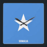 Reloj Cuadrado Somalia Flag Dazzling Patriotic<br><div class="desc">Somalia Flag Dazzling Patriotic Square Wall Clock in the colors and the elements of the Somalia national flag covering the front of the clock. National flag colors are complemented with the text "Somalia" on the bottom. Text is fully customizable using "Customize it!" feature. Feel free to change it, remove it...</div>