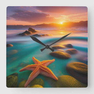 Reloj Cuadrado Starfish en la playa en Dawn
