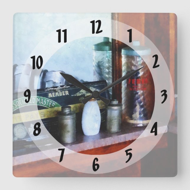 Reloj Cuadrado Suministros de barbero (Anverso)