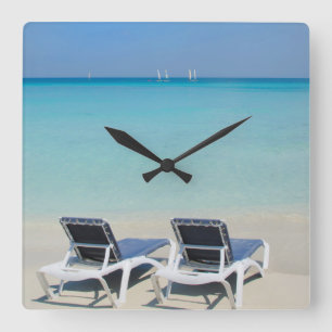 Reloj Cuadrado Varadero, Cuba. Sand And Beach Chairs