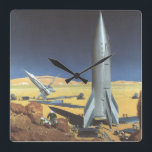 Reloj Cuadrado Vintage Science Fiction Desert Planet con cohetes<br><div class="desc">Ilustracion vintage futurista en el espacio exterior y planetas ciencia ficción imagen del cohete. Un cohete de ciencia ficción de viajes y transporte retro en un planeta extranjero o una luna con astronautas explorando el terreno en este desconocido mundo extraterrestre. Un clásico de los años 50: el diseño de ciencia...</div>