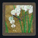 Reloj Cuadrado White Flowers and Green Stems on Brown Border<br><div class="desc">White flowers hang off green stems in this piece by Chariklia Zarris. Set against a tan background and surrounded by a brown border this is a simple but elegant painting. Add it to your home and enjoy the beauty!</div>