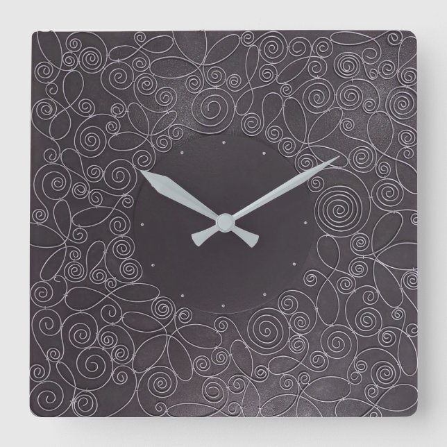 Reloj Cuadrado wire ornaments on black background (Anverso)