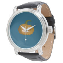 Reloj de calabaza tallada