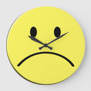Reloj de cara triste