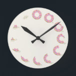 Reloj de donut<br><div class="desc">Comience el día con un donut y vea cómo cada mordedura se convierte en las horas del día.</div>