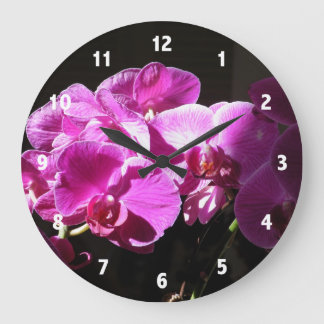 Reloj de fotografía de flores moradas rosadas para