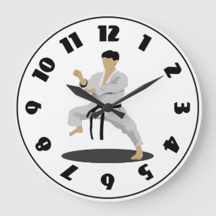 Reloj de karate pose